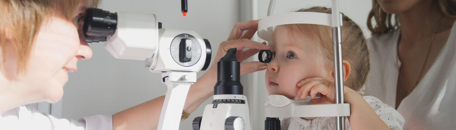 Doctor,Optometrist,Checks,Little,Girl's,Eyesight,-,Mother,And,Child